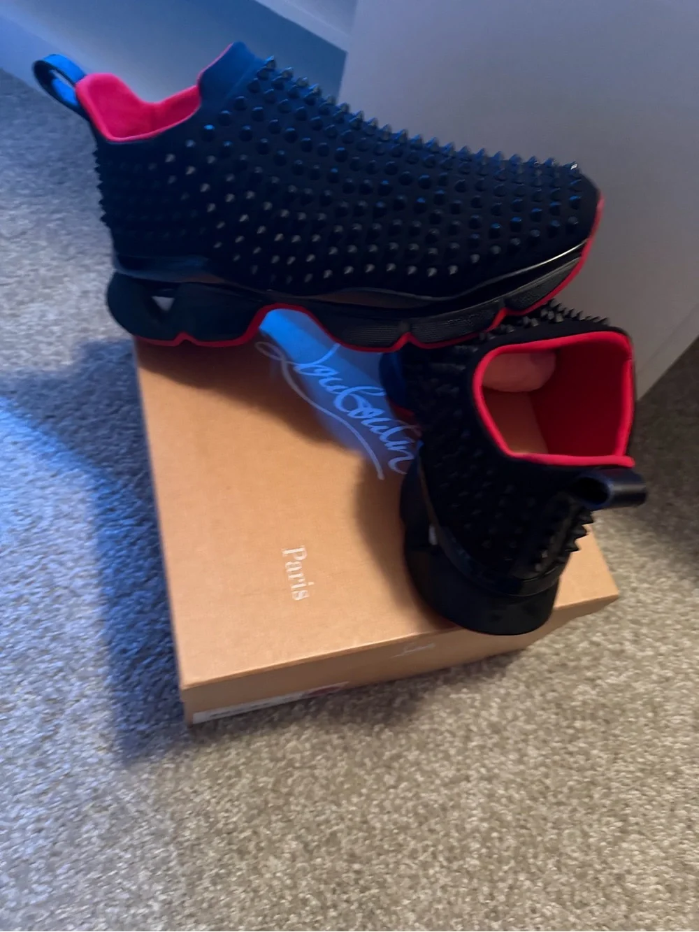 Christian Louboutin Black and Red Spike-Embellished Slip-On Sneakers
